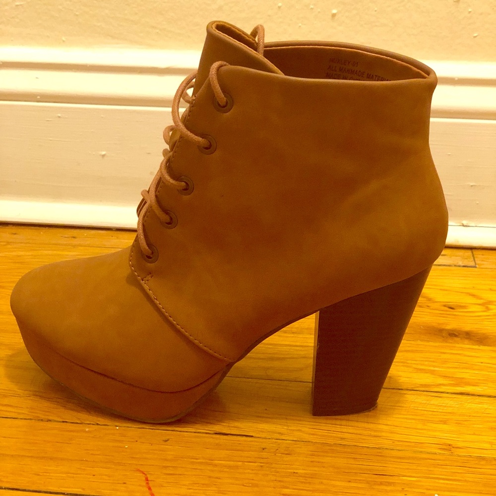 Lace up low heel bootie